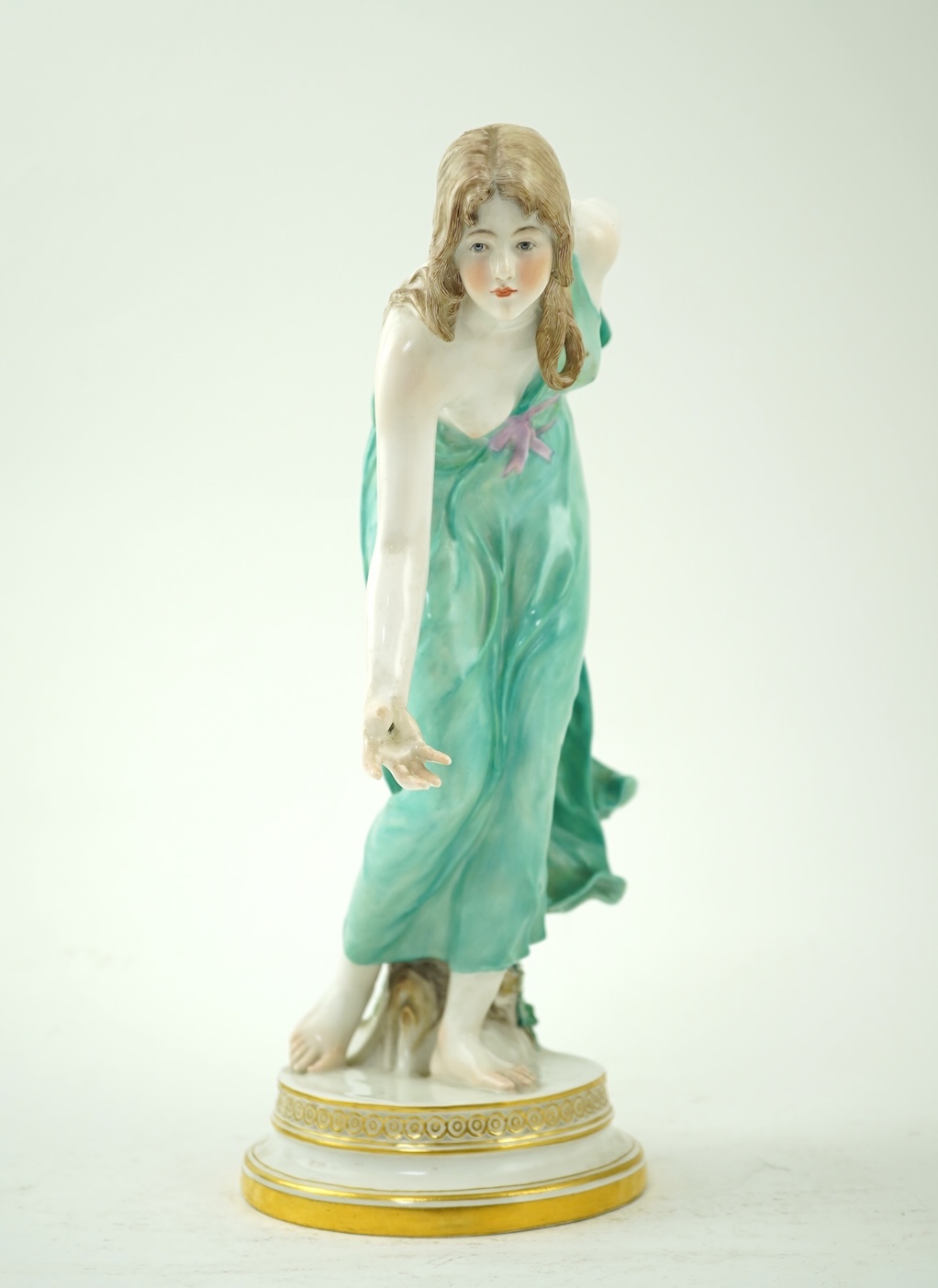 A Meissen porcelain figure, known as the 'Kugelspielerin', circa 1905, modelled by Walter Schott